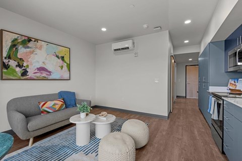 a living room with a couch and a table